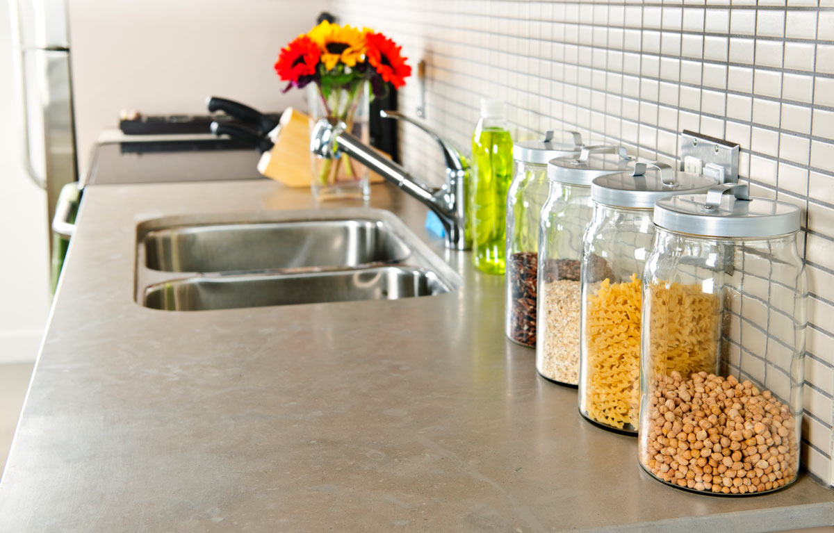 concrete countertops with jars on them